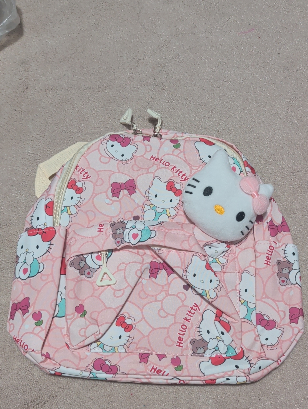 Pink Backpack with Plush Face Charm